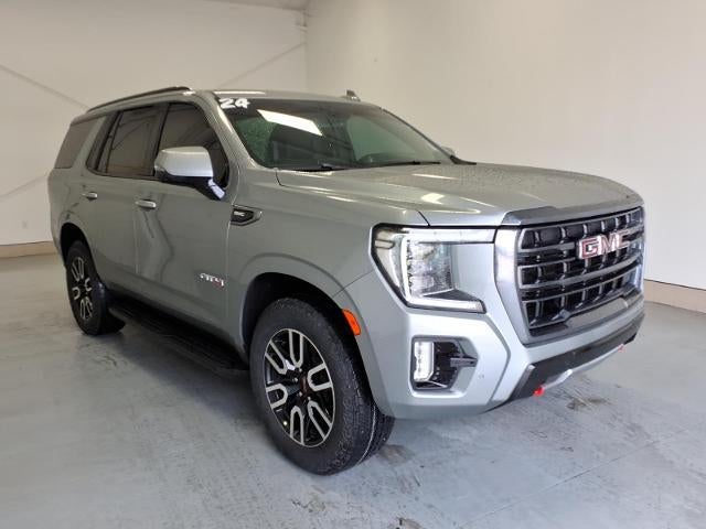 2024 GMC Yukon AT4 in Sterling Metallic — front three-quarter view