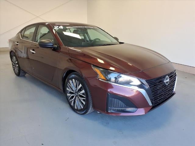 2024 Nissan Altima 2.5 SV in Garnet_Pearl_Metal — front three-quarter view