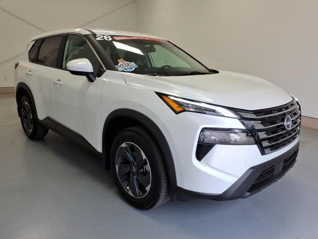 2026 Nissan Rogue SV in Everest_White — front three-quarter view