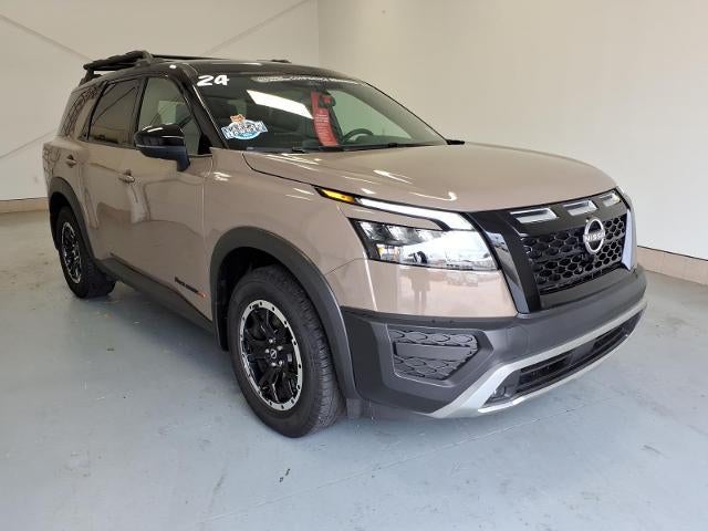 2024 Nissan Pathfinder Rock Creek in Baja — front three-quarter view